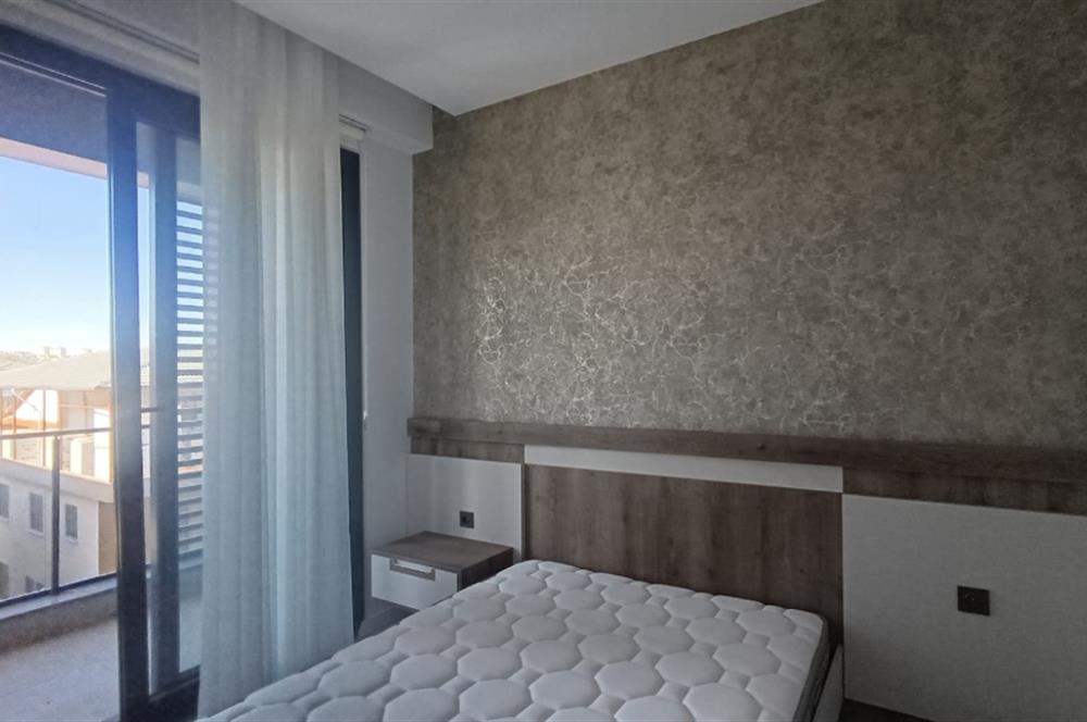 C21 LOFT'TAN SERVERGAZİ'DE HAVUZLU SİTEDE EŞYALI SATILIK 1+1