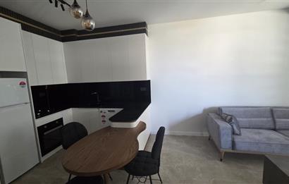 C21 LOFT'TAN SERVERGAZİ'DE HAVUZLU SİTEDE EŞYALI SATILIK 1+1