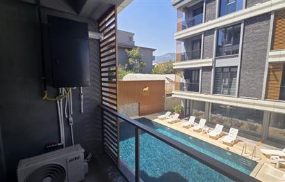 C21 LOFT'TAN SERVERGAZİ'DE HAVUZLU SİTEDE EŞYALI SATILIK 1+1