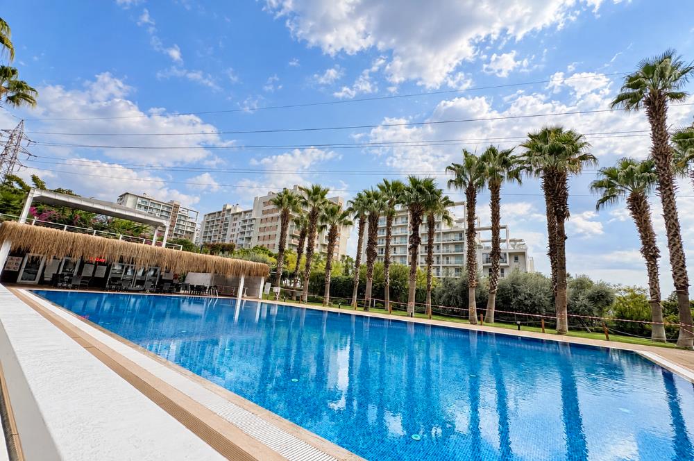 KARŞIYAKA SOYAK SİESTA BLUE SİTESİ'NDE EŞYALI KİRALIK 1+1 DAİRE