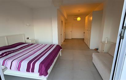BODRUM GÜNDOĞANDA ÖZEL PLAJLI SİTEDE SATILIK TRİPLEKS VİLLA