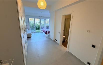 BODRUM GÜNDOĞANDA ÖZEL PLAJLI SİTEDE SATILIK TRİPLEKS VİLLA