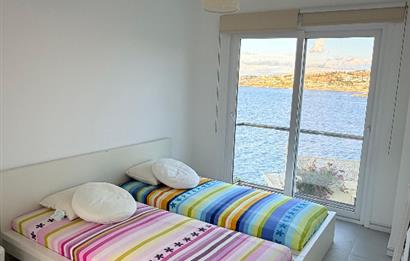 BODRUM GÜNDOĞANDA ÖZEL PLAJLI SİTEDE SATILIK TRİPLEKS VİLLA