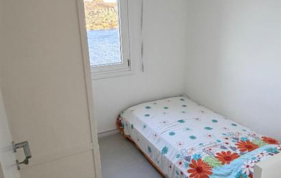 BODRUM GÜNDOĞANDA ÖZEL PLAJLI SİTEDE SATILIK TRİPLEKS VİLLA